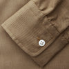 View 4 of product The Turnbull & Asser Brown Military Weekend Fit Cotton & Wool Shirt features a stand collar, 1-button cuffs, and two chest flap pockets; shown laid flat on a white background.