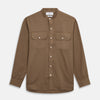 View 1 of product The Turnbull & Asser Brown Military Weekend Fit Cotton & Wool Shirt features a stand collar, 1-button cuffs, and two chest flap pockets; shown laid flat on a white background.