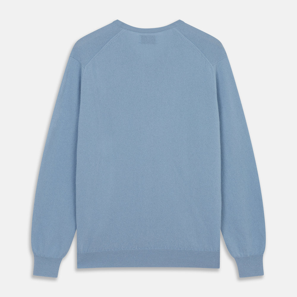 The Turnbull & Asser Pale Blue Cashmere Paden V-Neck Jumper features long sleeves, ribbed cuffs and hem, and is shown laid flat on a white background—an ideal choice for men's style.
