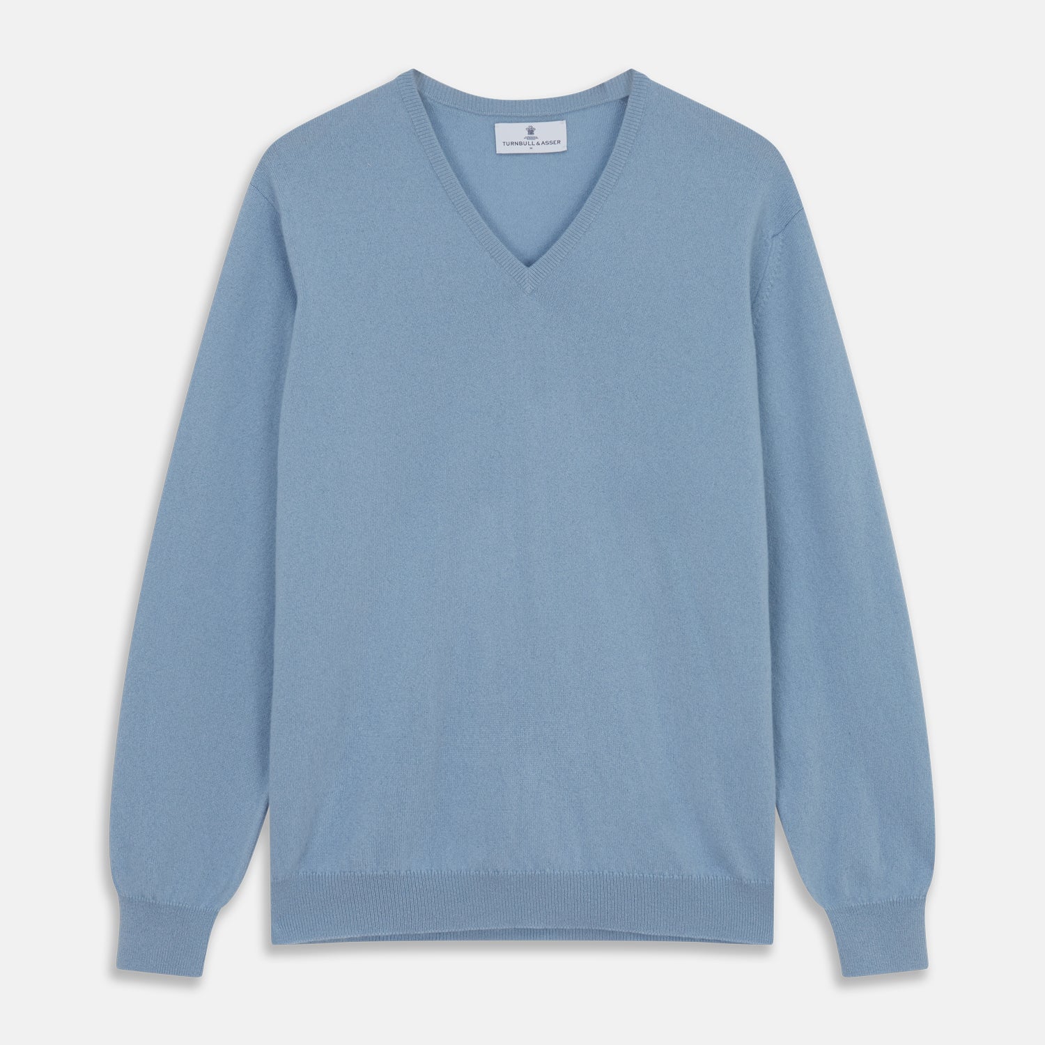 View 1 of product The Turnbull & Asser Pale Blue Cashmere Paden V-Neck Jumper features long sleeves, ribbed cuffs and hem, and is shown laid flat on a white background—an ideal choice for men's style.