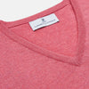View 2 of product The Pink Cashmere Paden V-Neck Jumper by Turnbull & Asser, knitted in Scotland, is shown laid flat on a white background. This long-sleeved sweater features ribbed cuffs, hem, and neckline.