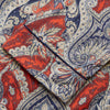 View 4 of product The Turnbull & Asser Red Baroque Silk-Blend Hyde Pyjama Set features a long-sleeve button-up shirt and matching pants in an intricate red, blue, and beige floral-geometric print, displayed flat against a white background.