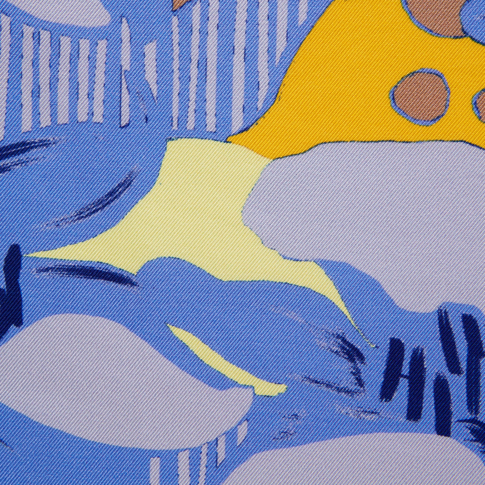 View 3 of product The Blue and Yellow Lily Silk Pocket Square by Turnbull & Asser features a vibrant, hand-drawn design of large blue lilies with dark stems on a yellow background adorned with pale blue stripes and tan abstract shapes.