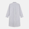 View 5 of product The Turnbull & Asser White and Navy Striped Cotton Sussex Nightshirt features long sleeves, a knee-length cut, a collar, front buttons, a chest pocket with dark trim, and a curved hem for modern comfort inspired by tradition.