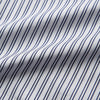 View 4 of product The Turnbull & Asser White and Navy Striped Cotton Sussex Nightshirt features long sleeves, a knee-length cut, a collar, front buttons, a chest pocket with dark trim, and a curved hem for modern comfort inspired by tradition.