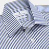 View 2 of product The Turnbull & Asser Navy Stripe Cotton Regular Fit Whitby Shirt features vertical blue and white stripes, long sleeves, a collar, double cuffs, and a button-down front, shown laid flat on a white background.