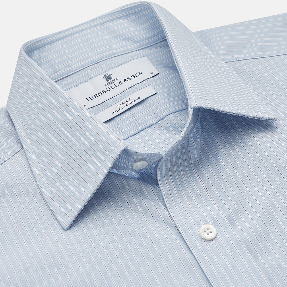 The Turnbull & Asser Pale Blue Stripe West Indian Sea Island Cotton Regular Fit Mayfair Shirt features long sleeves, a button-down front, and a classic collar—an essential for any men's wardrobe, shown on a plain white background.