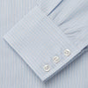 View 4 of product The Turnbull & Asser Pale Blue Stripe West Indian Sea Island Cotton Regular Fit Mayfair Shirt features long sleeves, a button-down front, and a classic collar—an essential for any men's wardrobe, shown on a plain white background.