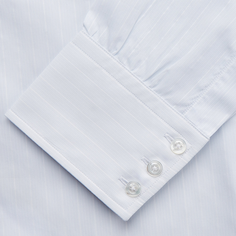 A Cloudy Blue Stripe Cotton Regular Fit Mayfair Shirt by Turnbull & Asser, featuring a T&A collar and button-down front, is laid flat on a plain white background.