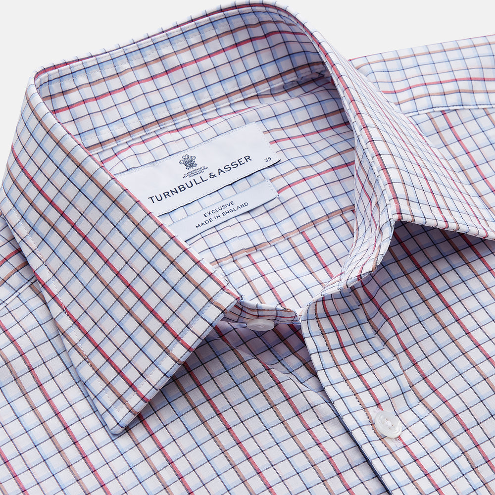 The Turnbull & Asser Red Multi-check Cotton Regular Fit Mayfair Shirt for men features a T&A collar, button cuffs, and a small red check pattern, shown laid flat on a white background.