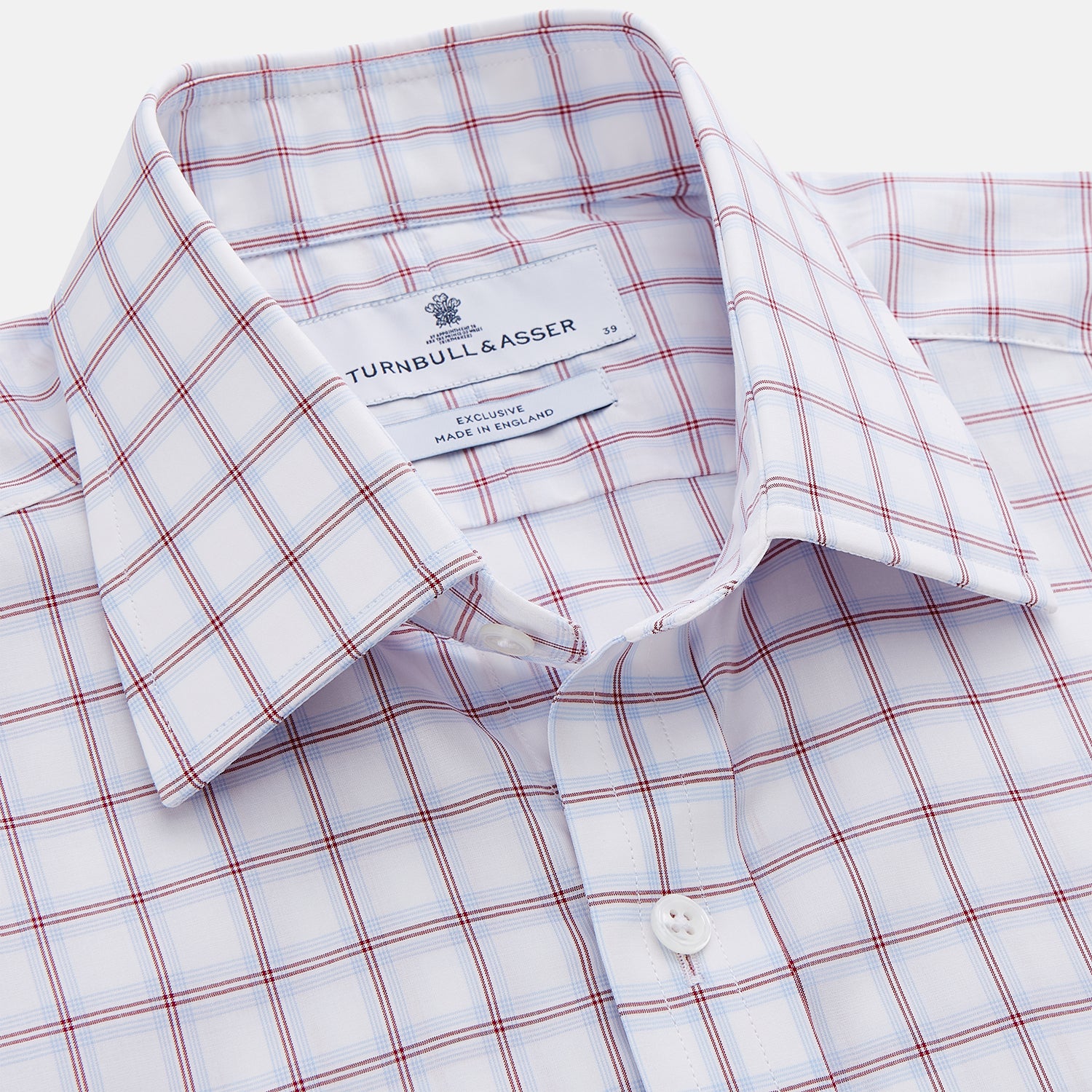 View 2 of product The Turnbull & Asser Red and Blue Multi-check Cotton Regular Fit Mayfair Shirt features a white base with red and blue checks, long sleeves, a T&A collar, and is shown flat against a white surface.