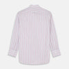 View 5 of product The Turnbull & Asser Red Multi-stripe Cotton Regular Fit Mayfair Shirt features red and blue vertical stripes on white, a T&A collar, and long sleeves. The shirt is shown neatly laid flat on a white surface.