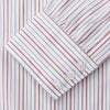 View 3 of product The Turnbull & Asser Red Multi-stripe Cotton Regular Fit Mayfair Shirt features red and blue vertical stripes on white, a T&A collar, and long sleeves. The shirt is shown neatly laid flat on a white surface.
