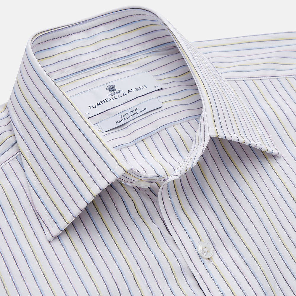 The Turnbull & Asser Purple Multi-stripe Cotton Regular Fit Mayfair Shirt is a men’s button-up with a T&A collar, showcasing thin vertical stripes, neatly laid flat against a white background.