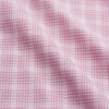 View 4 of product The Turnbull & Asser Pink Multi-check Cotton Regular Fit Mayfair Shirt features long sleeves, a T&A collar, buttoned cuffs, and a light pink check pattern, shown against a plain white background.