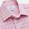 View 2 of product The Turnbull & Asser Pink Multi-check Cotton Regular Fit Mayfair Shirt features long sleeves, a T&A collar, buttoned cuffs, and a light pink check pattern, shown against a plain white background.