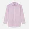 View 1 of product The Turnbull & Asser Pink Multi-check Cotton Regular Fit Mayfair Shirt features long sleeves, a T&A collar, buttoned cuffs, and a light pink check pattern, shown against a plain white background.