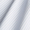 View 4 of product The Turnbull & Asser Pale Blue and White Multi-stripe Cotton Regular Fit Mayfair Shirt features a T&A collar and buttoned cuffs, shown on a plain white background.