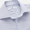 View 2 of product The Turnbull & Asser Faded Blue Block Check Cotton Shelton Shirt features a tailored fit, long sleeves, button-down front, and classic collar, displayed flat on a white background.