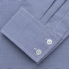 View 3 of product The Turnbull & Asser Navy Pattern Cotton Voile Tailored Fit Shelton Shirt is laid flat, showcasing its classic collar and white front and cuff buttons.