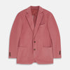 View 1 of product The Turnbull & Asser Pink Cord Bern Blazer features notch lapels, two brown buttons, three front pockets, and buttoned cuffs, showcasing Italian tailoring against a plain white background.