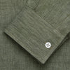 View 2 of product The Sage Green Linen Weekend Fit Finch Shirt by Turnbull & Asser features a classic collar, white buttons, and a single chest pocket—an essential piece for any men's wardrobe. Displayed flat on a white background for a clean look.
