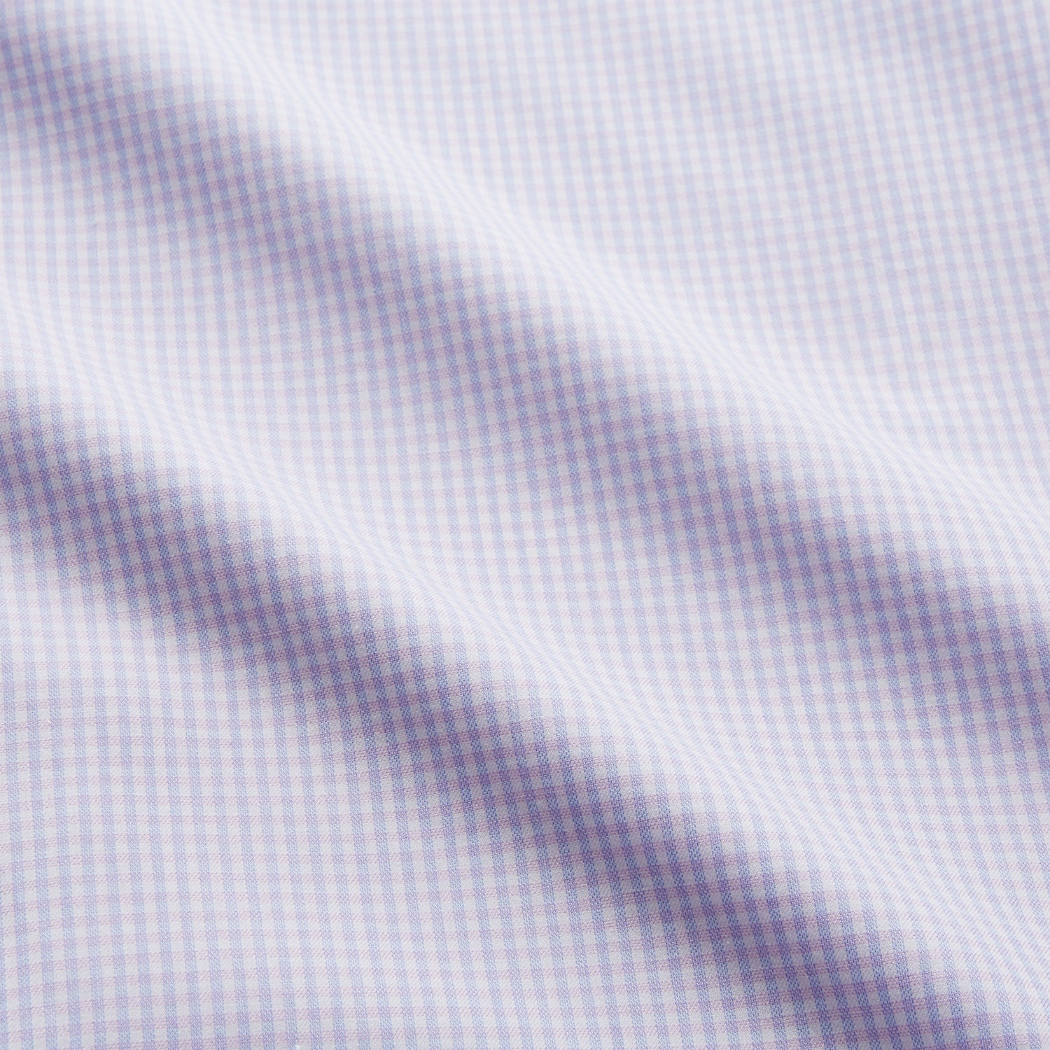 View 4 of product The Blue Multi Check Cashmerello Weekend Fit Hayne Shirt by Turnbull & Asser features long sleeves, a button-down front, Dorset collar, buttoned cuffs, and a blue check pattern, shown laid flat on a white background.