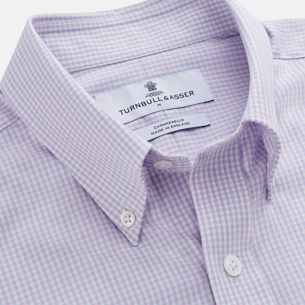 The Blue Multi Check Cashmerello Weekend Fit Hayne Shirt by Turnbull & Asser features long sleeves, a button-down front, Dorset collar, buttoned cuffs, and a blue check pattern, shown laid flat on a white background.