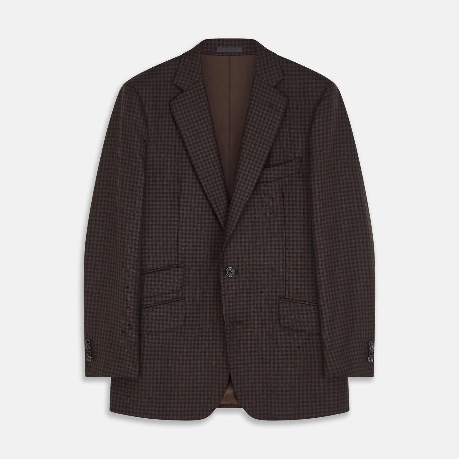 View 1 of product The Turnbull & Asser Brown and Navy Checked Wool Barrington Blazer, tailored in Italy with notched lapels, a chest pocket, two front flap pockets, and a single-breasted closure, is shown on a plain white background.