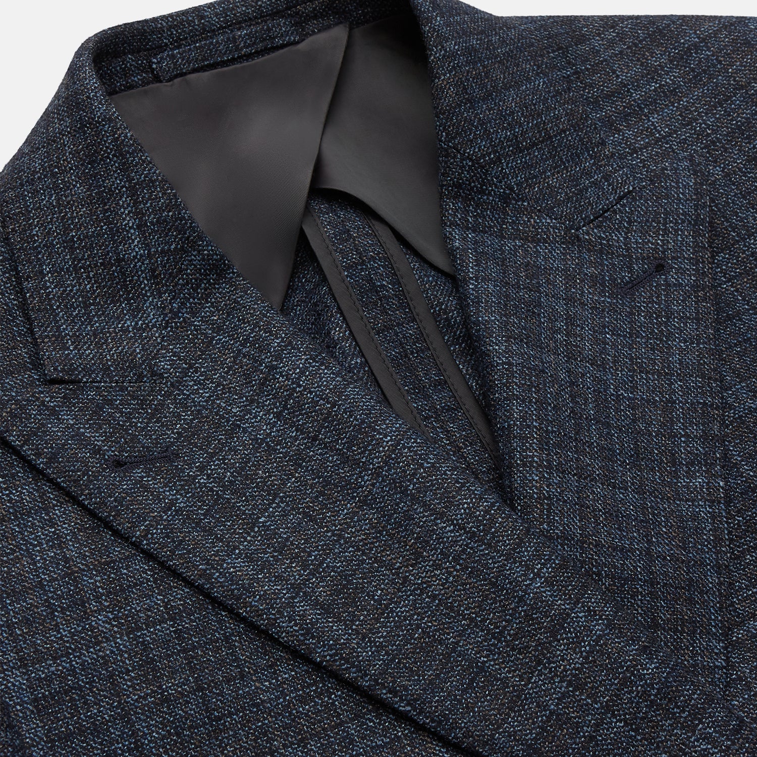 View 2 of product The Turnbull & Asser Navy Check Wool and Cashmere Blend Double Breasted Bertie Blazer features peak lapels, front flap pockets, and brown buttons, shown against a plain white background.