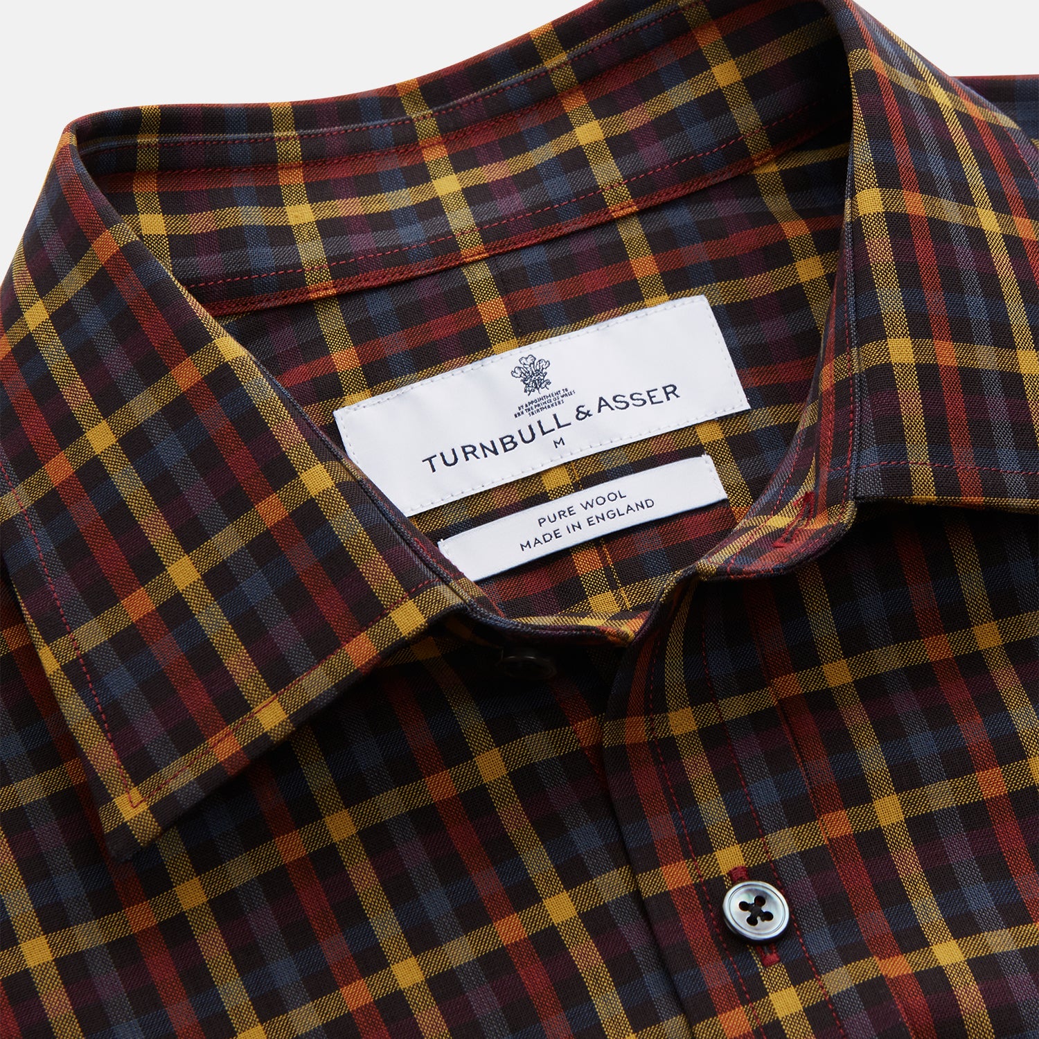 View 3 of product The Turnbull & Asser Blue, Yellow and Red Multi Check Wool Weekend Fit Finch Shirt is a men's long-sleeve button-up with a pointed collar and chest pocket, displayed on a plain white background.