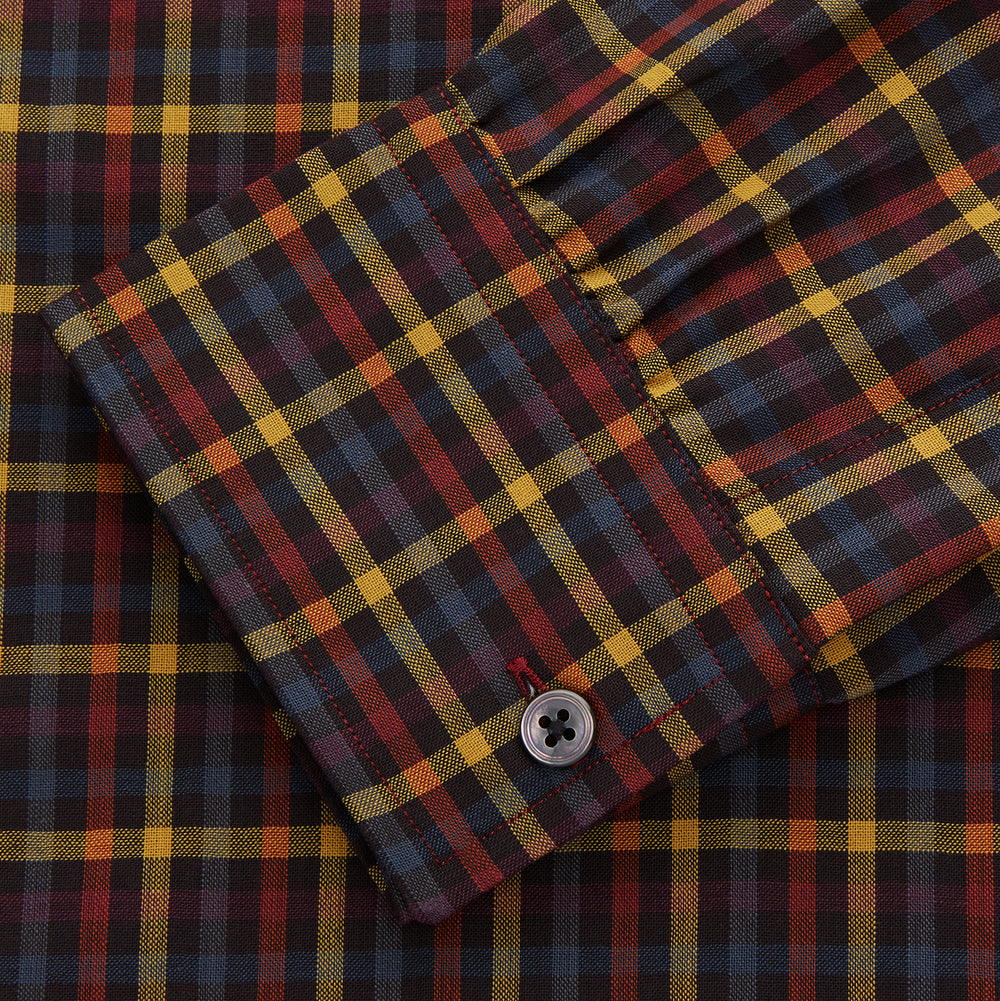 The Turnbull & Asser Blue, Yellow and Red Multi Check Wool Weekend Fit Finch Shirt is a men's long-sleeve button-up with a pointed collar and chest pocket, displayed on a plain white background.