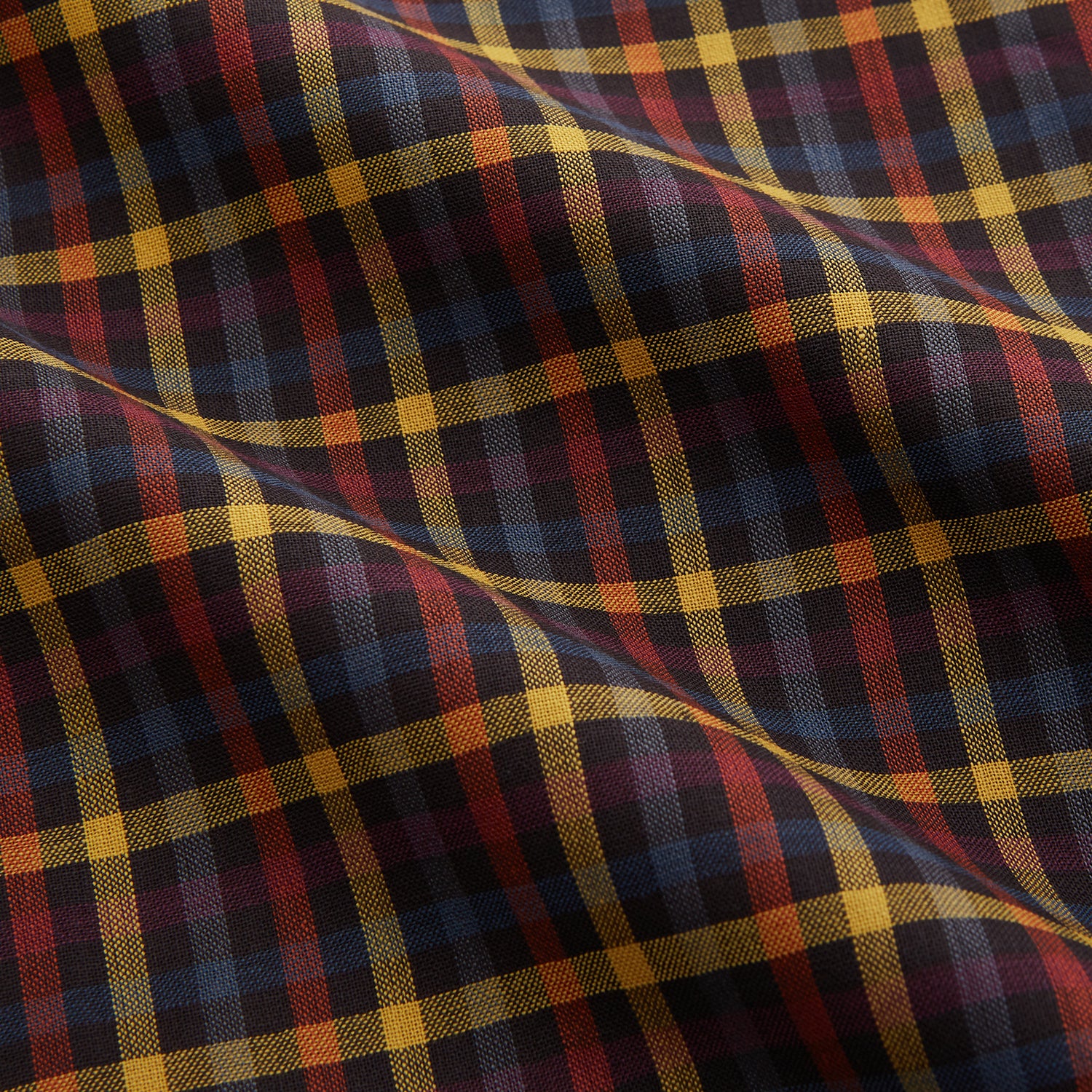 View 4 of product The Turnbull & Asser Blue, Yellow and Red Multi Check Wool Weekend Fit Finch Shirt is a men's long-sleeve button-up with a pointed collar and chest pocket, displayed on a plain white background.