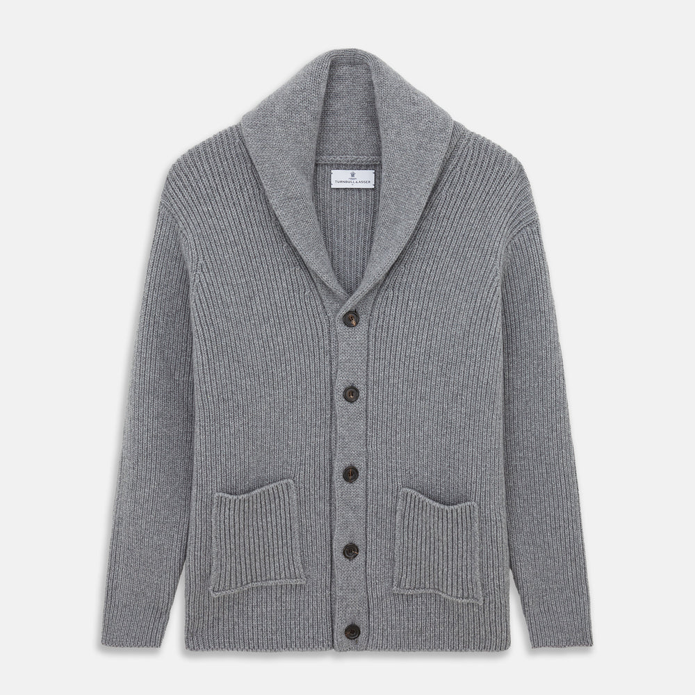 The Turnbull & Asser Grey Ribbed Cashmere Ainsley Cardigan is a luxury 3-ply cashmere knit with a shawl collar, button-up front, and two front pockets, shown laid flat on a white background.