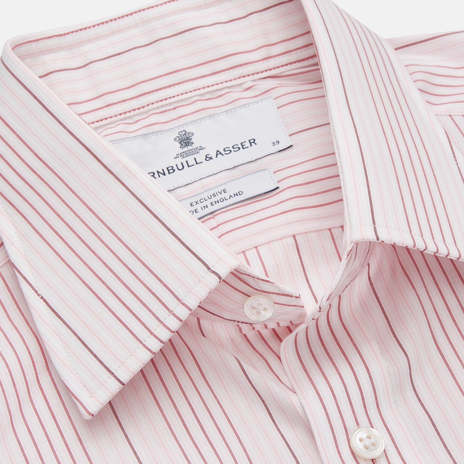 View 2 of product Turnbull & Asser Pink and White Stripe Twill Cotton Regular Fit Shirt with T&A collar and double cuffs, neatly displayed on a plain white background.