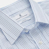 View 2 of product Turnbull & Asser’s Blue and White Stripe Twill Cotton Regular Fit Shirt features a T&A collar, double cuffs, and classic stripes, shown laid flat on a white background.