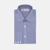 View 1 of product The Turnbull & Asser Navy & White Gingham Check Cotton Regular Fit Shirt features a T&A collar, 3-button cuffs, and is displayed neatly folded on a plain white background.