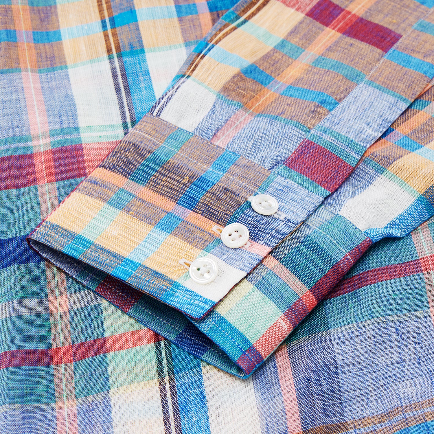 View 3 of product Turnbull & Asser Blue and Teal Madras Check Regular Fit Linen Shirt, featuring a T&A collar and 3-button cuffs, displayed against a plain white background.