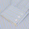 View 3 of product The Turnbull & Asser Blue and Yellow Stripe Poplin Cotton Regular Fit Shirt features a T&A collar, 3-button cuffs, and vertical stripes. It is laid flat on a white background.