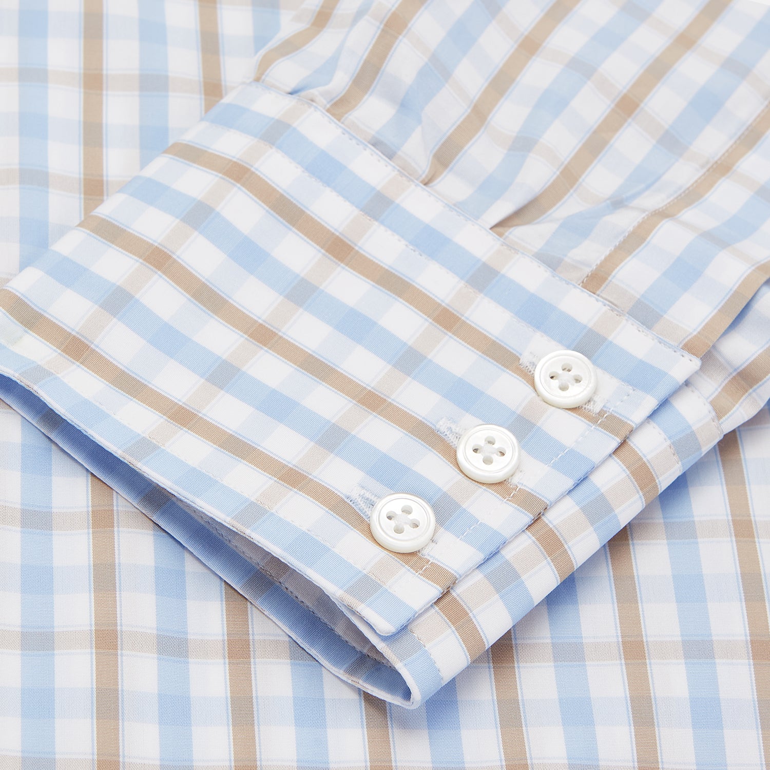 View 3 of product The Turnbull & Asser Blue and Brown Check Poplin Shirt features a T&A collar, 3-button cuffs, and a regular fit cotton construction, shown laid flat against a white background.