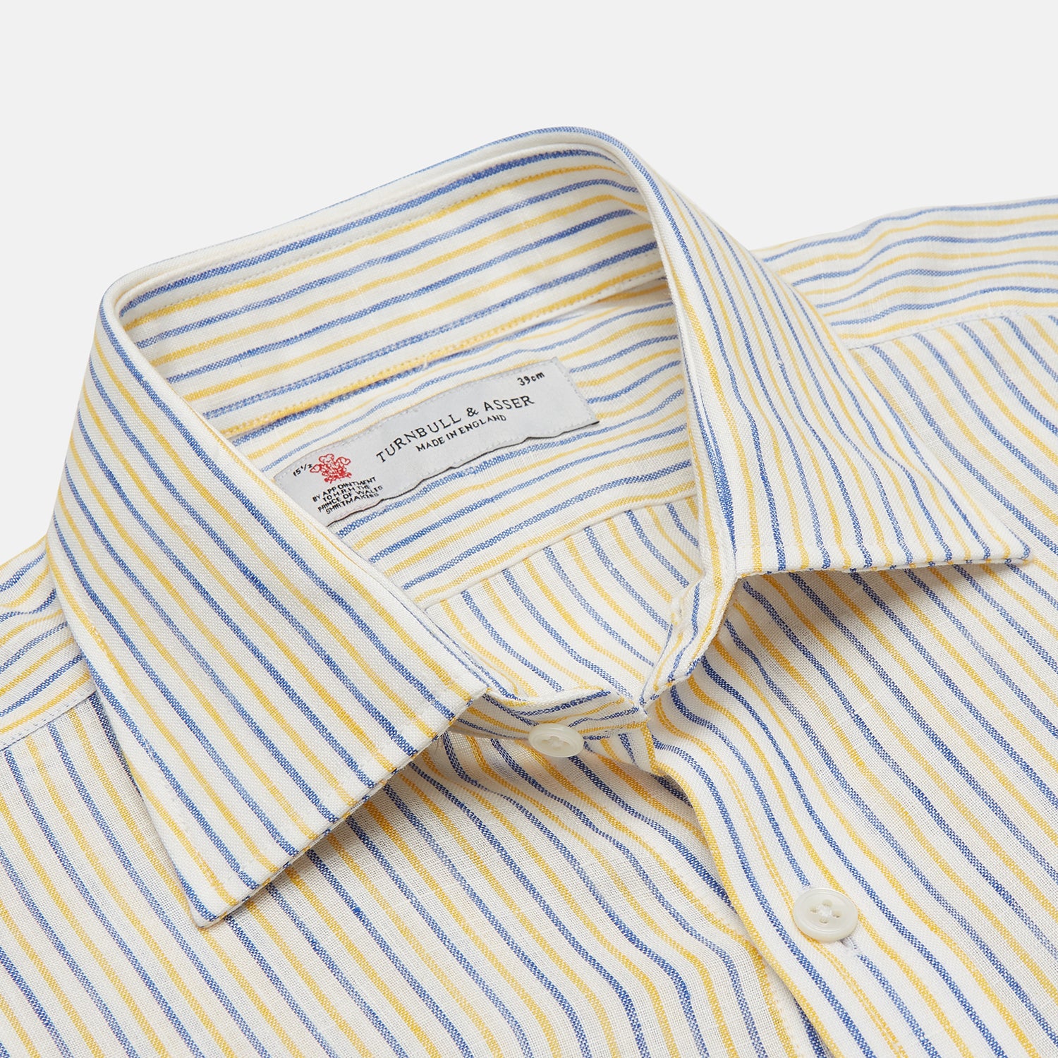 View 3 of product Turnbull & Asser's Yellow and Blue Ticking Stripe Linen Shirt features a POW collar and 3-button cuffs, displayed on a plain light gray background.