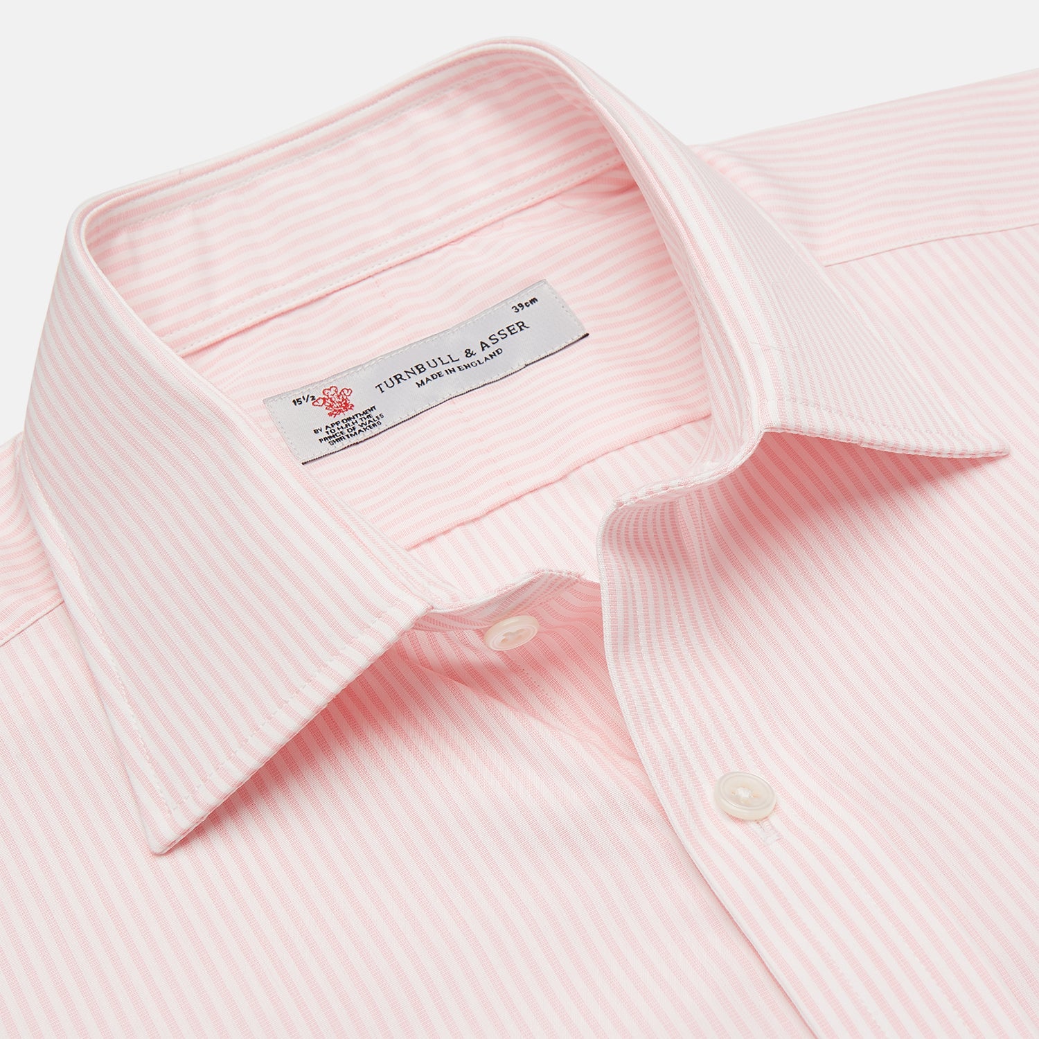 View 3 of product The Turnbull & Asser Pink and White Stripe Shirt features a POW collar and 3-button cuffs, displayed laid flat on a white background.