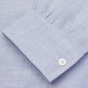 View 3 of product The Turnbull & Asser Blue Chambray Weekend Fit Shirt features a Dorset collar, 1-button cuffs, and white buttons, shown flat on a white background.