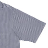 View 3 of product The Turnbull & Asser Navy & White Lyocell Stripe Holiday Fit Shirt is a short-sleeve button-up with a revere collar, vertical navy and white stripes, and a left chest pocket.