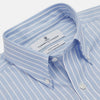 View 2 of product The Turnbull & Asser Blue and White Broad Stripe Oxford Weekend Fit Shirt features a Dorset collar, 1-button cuffs, and classic stripes—ideal for smart-casual days. Laid flat on a white background.