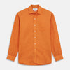 View 1 of product The Turnbull & Asser Orange Weekend Fit Linen Nevis Shirt features a Derby collar, long sleeves with 1-button cuffs, white buttons, and a chest pocket, shown flat against a white background.