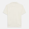View 5 of product The Turnbull & Asser Cream Holiday Fit Silk Phillips Shirt features a revere collar, short sleeves, and three front pockets, shown flat on a white background.