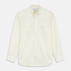 View 1 of product The Turnbull & Asser Cream Weekend Fit Larkin Shirt features a Dorset collar, 3-button cuffs, and two button-flap chest pockets in soft herringbone cotton, displayed flat on a white background.