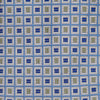 View 2 of product A Turnbull & Asser Blue and Yellow Geometric Silk Jacquard Tie is shown rolled up on a plain light background.