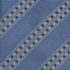 View 2 of product The Turnbull & Asser Dark Blue Baroque Stripe Silk Jacquard Tie, featuring elegant baroque stripes, is displayed rolled up on a white background.